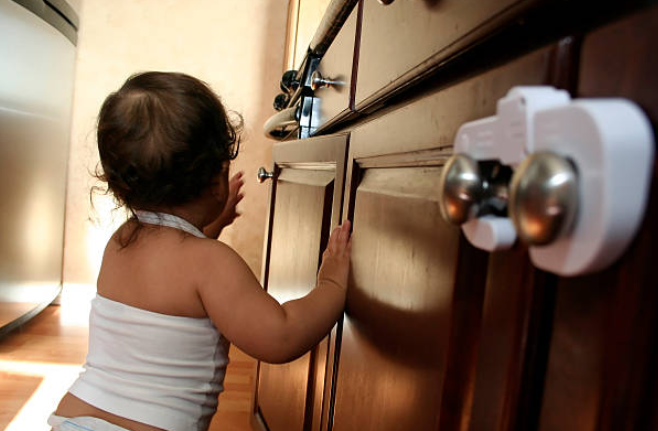 A baby facing away from the camera