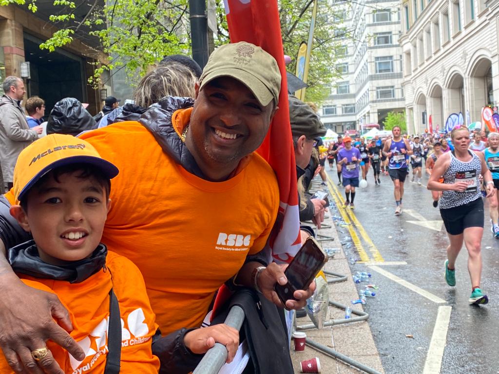 2 RSBC volunteers smiling at the camera